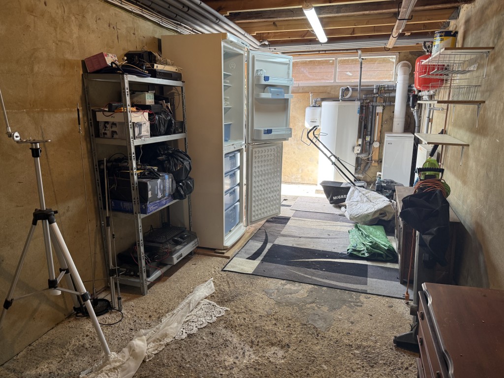 Lot: 122 - DETACHED BUNGALOW WITH ROOF CONVERSION AND POTENTIAL - Internal shot of garage